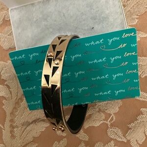 Elegant Gold-Tone Bracelet with leather backing
